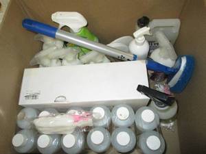 box of cleaning chemicals and soaps...