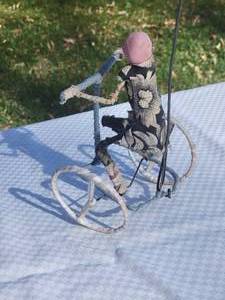 lot 93 image: Folk Art Galimoto Boy