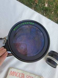 lot 57 image: Minolta SRT-200 (55mm&200mm marco Lenses)