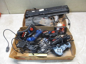 lot 117 image: Video Game controllers and power strips