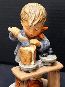 lot 555 image: Hummel Figurine A Fair Measure