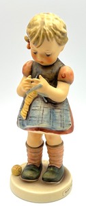 lot 575 image: Three Hummel Figurines Hummel Figurine Signs of Spring, Hummel Figurine Stitch in Time, Hummel Figure Weary Wanderer