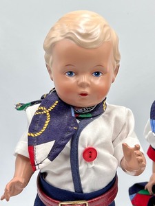 lot 579 image: Adorable Pair of Vintage Boy and Girl Schildkrot Turtlemark Celluloid Dolls
