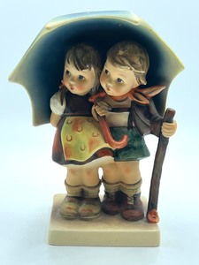 lot 573 image: Hummel Figurine Stormy Weather