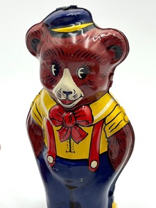 lot 598 image: Three Vintage Wind Up Toys