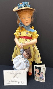 lot 588 image: R. John Wright Doll Marcella and Raggedy Ann
