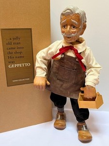 lot 611 image: Xenis Collection Geppetto Musical Figurine