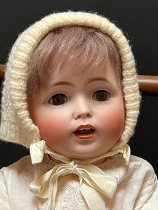 lot 689 image: Adorable Antique Bisque Kestner JDK German Doll and Doll Highchair