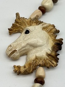 lot 788 image: Carved Bone Necklace by Crazy Bones