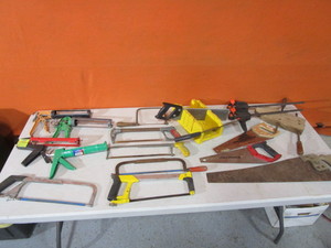 lot 210 image: Saws, Caulk Guns, Clamps