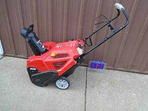 Troy Bilt 179cc 21 electric start snow thrower. Appears new. Styill has plastic on handle. As shown.