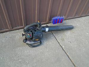 Poulan 2 cycle leaf blower. Used condition. Tested & works. As shown.