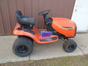 Ariens lawn tractor hydro drive 19.5 hp motor for parts or repair. Good chasistires. Motor turns over. No deck. As shown.