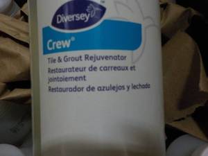 lot 62 image: 6 qt Bottles Diversey Crew Tile and Grout Rejuvenator