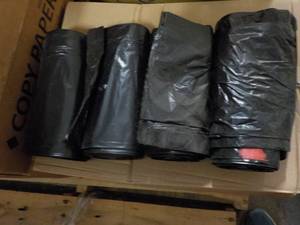 lot 100 image: 4 Rolls Extra Large Trash Bags...