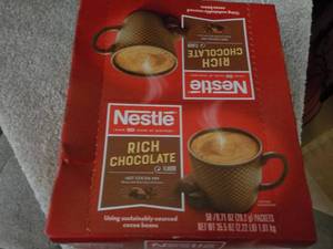 lot 107 image: Nestles 50 Packets Hot Cocoa Mix...