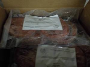 lot 383 image: 11 lb. Bag Frozen Knockwurst...