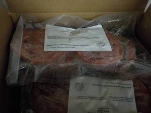 lot 384 image: 8 - 10 lb. Box Frozen Cooked Ham En...