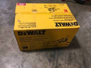 Dewalt 15 Amp Corded 12 in. Double Bevel Sliding Compound Miter Saw, Blade Wrench and Material Clamp customer return see pictures