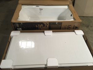 lot 26 image: Pallet with Bath Tub (slight damage) and shower wall customer returns see pictures