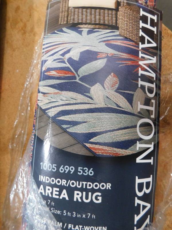 lot 57 image: Hampton Bay Blue Palm 5 ft. x 7 ft. IndoorOutdoor Area Rug