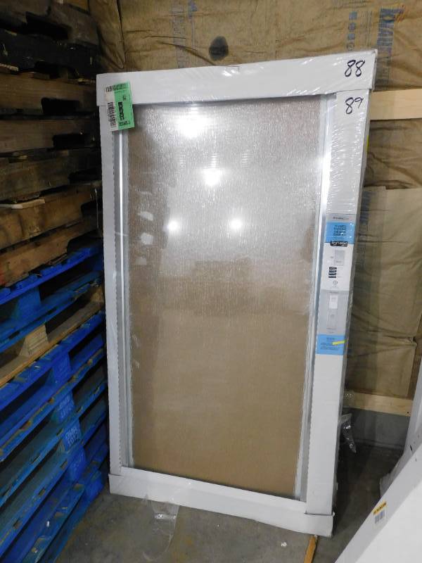 lot 88 image: Franklin Brass 34 in. x 63-34 in. Framed Pivot Shower Door in Chrome with Rain Glass