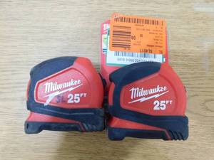 lot 106 image: (2) Milwaukee Tape Measures