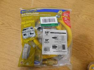 lot 105 image: BrassCraft 12 in. MIP x 12 in. MIP x 60 in. Gas Connector (58 in. O.D.) w SafetyPlus2 Thermal Excess Flow Valve (107,000 BTU)