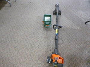 lot 18 image: Remington Rustler Weed Trimmer