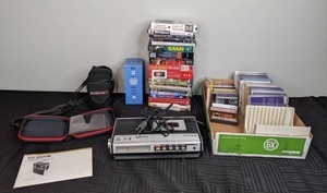 Eclectic Assortment of Vintage Electronics and Entertainment Elvis, Lorie Line, Nikon, Sony, Bigston, Disney, Etc.