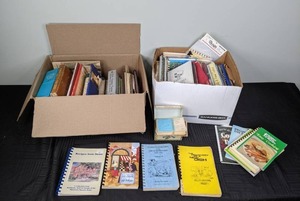 As Assortment of Cookbooks includes Better Homes and Garden, Church, and so Much More
