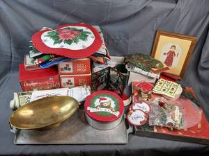 A Collection of Christmas Items Including Various Table Fabrics, Glass Mugs, Stoneware Mugs, Tins, Old Fashioned Glasses and More