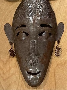 lot 53 image: Tribal Looking Tin Wall Decor