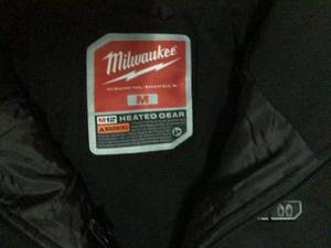 lot 70 image: Milwaukee M12 Heated Jacket Kit M, Black, Model# 204B-21M jacket only review pictures