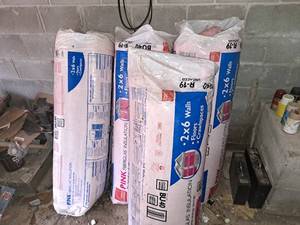 lot 15 image: Lot of (4 Rolls) R-19 2x6 Unfaced Insulation