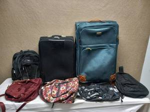 lot 59 image: (2) SUITCASES (5) BACKPACKS