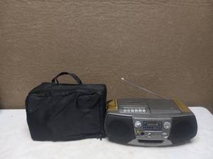 lot 91 image: VINTAGE RADIO COMBO CD & CASSETTE WITH TAPES AND CASE