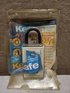 lot 100 image: RETRACTABLE LOCK BOX