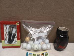 lot 102 image: GOLF BOOK, BALLS & GOLF BALL MONOGRAMMER