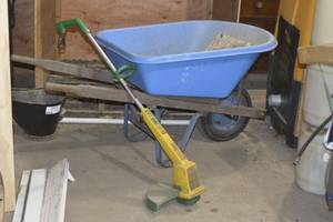 lot 98 image: WHEEL BARROW AND WEED WHIP