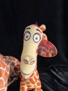 lot 16 image: 2 New Giraffe Stuffed Animals