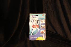 lot 87 image: As Seen on TV- Roto Punch - New in Box
