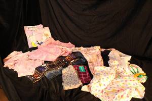 lot 139 image: Girls Clothes, Assorted Sizing PJs, Pants, and Shirts