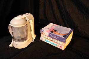 lot 183 image: Beaba BabyCook Food Maker and Pregnancy Books