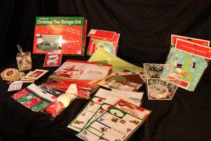 lot 190 image: Christmas Necessities Lot Gift Tags, Tree Storage Unit, Ornament Hooks and More