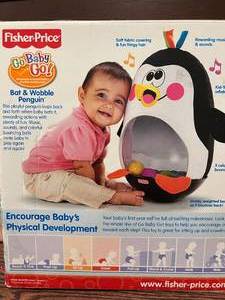 lot 220 image: NEW Match-Your-Math Puzzle and Bat & Wobble Penguin