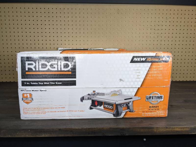 lot 101 image: RIDGID 6.5 Amp Corded 7 in. Table Top Wet Tile Saw