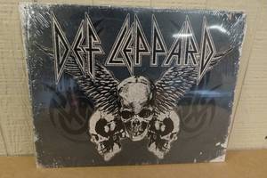 lot 226 image: Novelty Metal Sign -Def Leppard - Made in USA