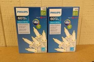 lot 232 image: 2 Sets Philips IndoorOutdoor Warm White 60 Mini Lights -19.6ft Each