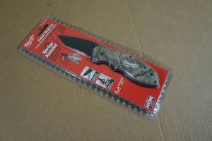 lot 34 image: Milwaukee Spring Assisted Fastback Camo Folding Knife